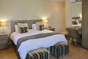 Luxe beddengoed, een kluis op de kamer, een strijkplank/strijkijzer