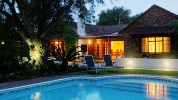 Outdoor pool, pool umbrellas, sun loungers