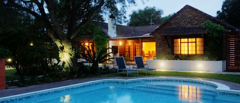 Outdoor pool, pool umbrellas, sun loungers