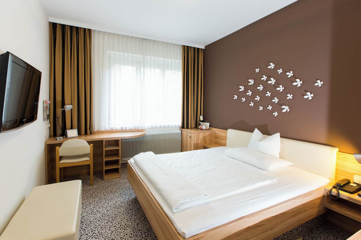Literie hypoallergénique, couette en duvet d'oie, minibar