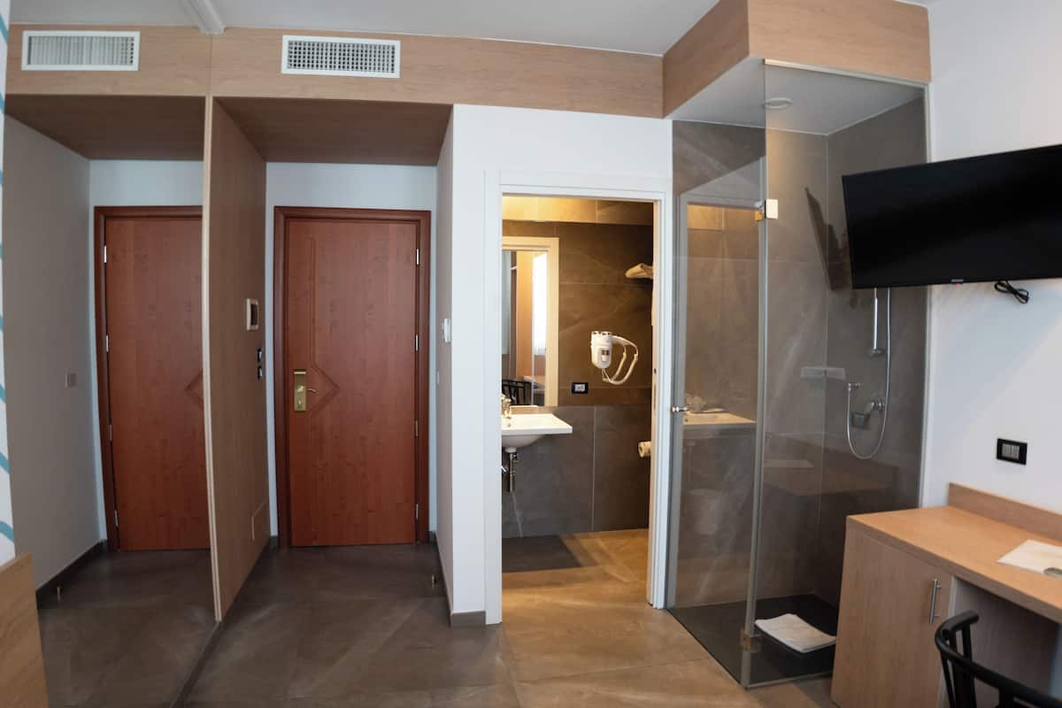 Minibar, in-room safe, blackout curtains, iron/ironing board