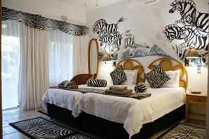 Premium bedding, in-room safe, individually decorated, blackout curtains - Bhangazi Lodge (St. Lucia)