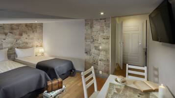 Estúdio luxo | Individualmente decorados, Wi-Fi de cortesia, roupa de cama