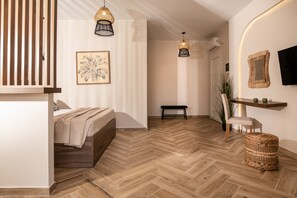 Premium Suite | Premium bedding, memory foam beds, in-room safe, individually decorated
