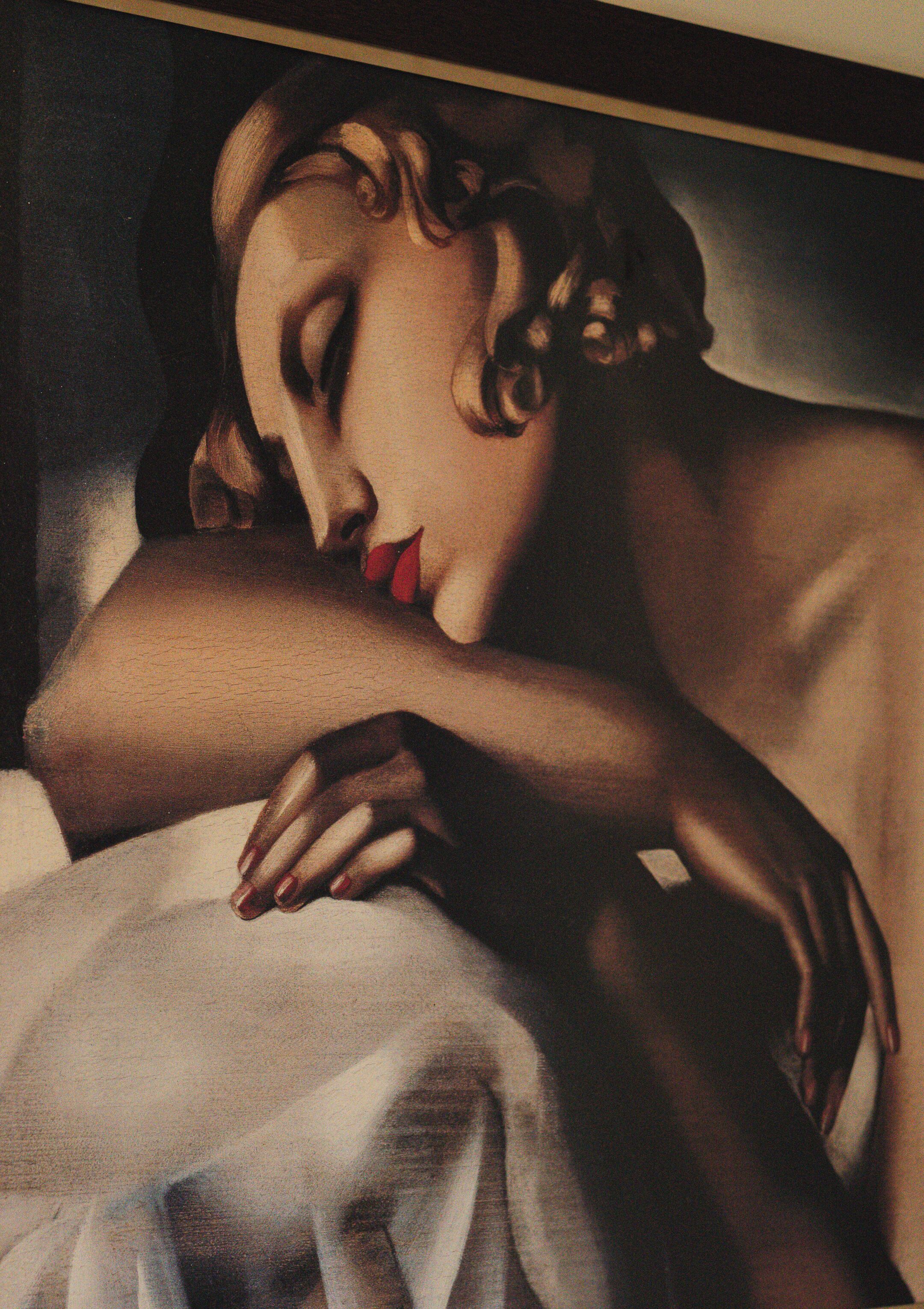 A painting of a reclining woman with a book.