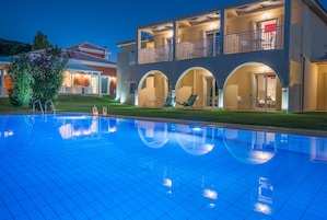 Seasonal outdoor pool, pool umbrellas, sun loungers