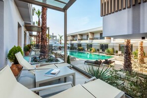 Deluxe Apartment, 1 Bedroom, Pool View | Courtyard view - Pefki Deluxe Residences (Kassandra)