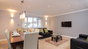 Townhome, 4 Bedrooms | Living area | Flat-screen TV, DVD player