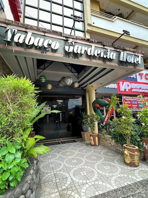 A building with a sign that reads 'Tabaco Gardelia Hotel' and a visible entrance. - Tabaco Gardenia Hotel (Tabaco City)
