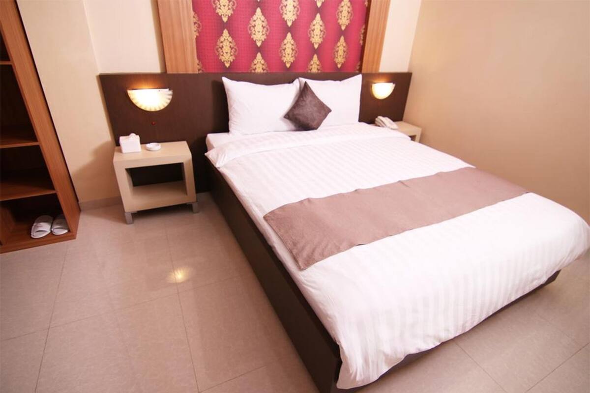 Habitación superior | Ropa de cama de alta calidad y escritorio