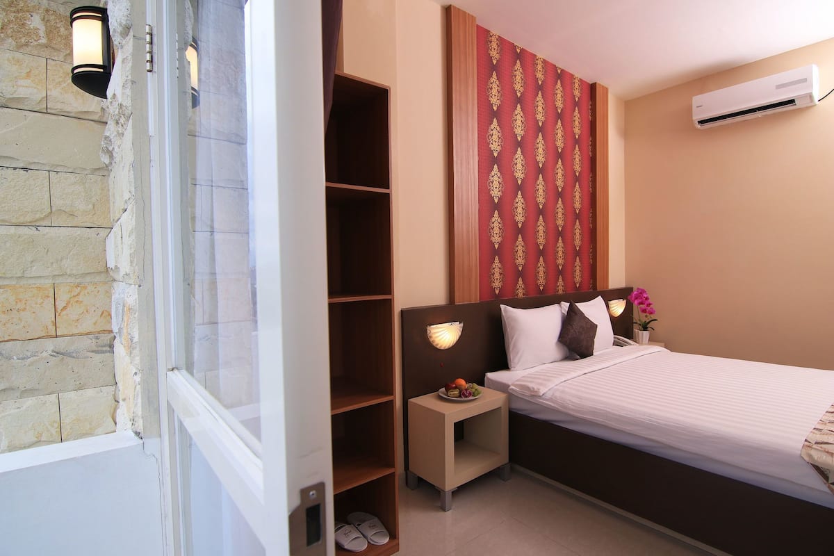 Habitación Deluxe | Ropa de cama de alta calidad y escritorio