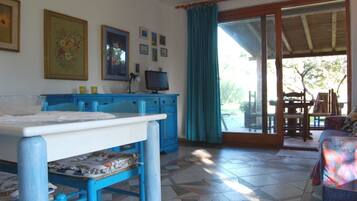 Departamento, 1 habitación | Área de sala de estar | Televisión de pantalla plana