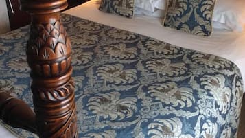 Deluxe Family Room | Desk, iron/ironing board, bed sheets