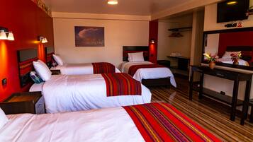 Quadruple Room, Private Bathroom | Down comforters, in-room safe, individually decorated