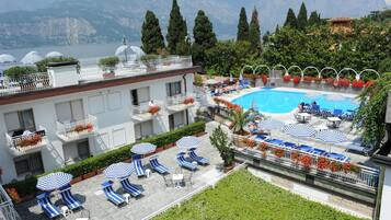 Outdoor pool, pool umbrellas, pool loungers