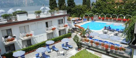 Outdoor pool, pool umbrellas, pool loungers