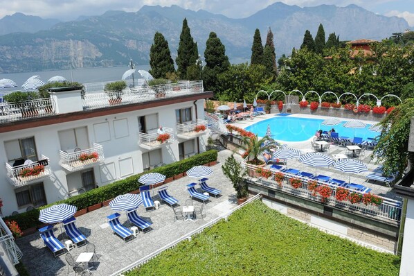 Outdoor pool, pool umbrellas, pool loungers