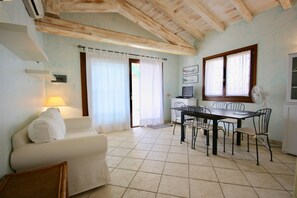 Apartment, 3 Bedrooms | Living area | Flat-screen TV - Casa Gabriella (Olbia)