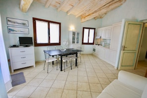Apartment, 3 Bedrooms | Living area | Flat-screen TV