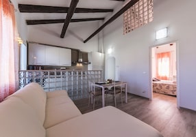 Deluxe Apartment, Multiple Beds, Non Smoking, Canal View | Living area | 40-inch flat-screen TV with digital channels, TV