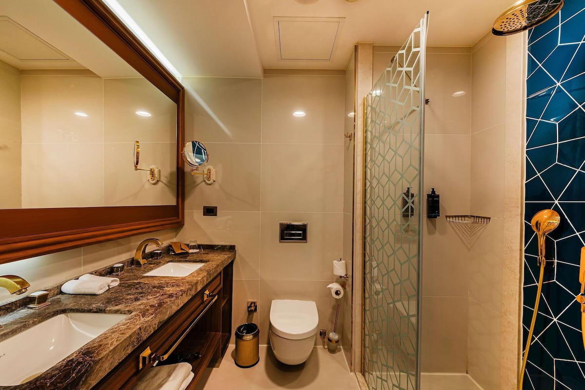 Family Suite, 2 Double Beds | Minibar, in-room safe, desk, laptop workspace