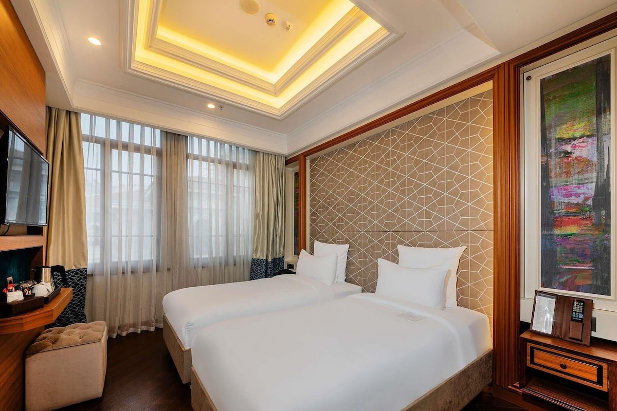 Superior Room, 2 Single Beds | Minibar, in-room safe, desk, laptop workspace