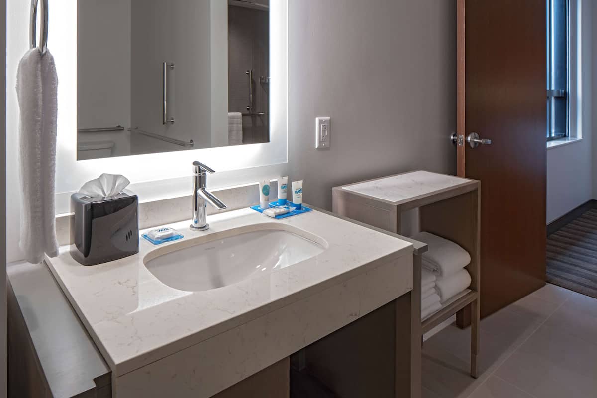 separate bathtub and shower, free toiletries, hair dryer, towels