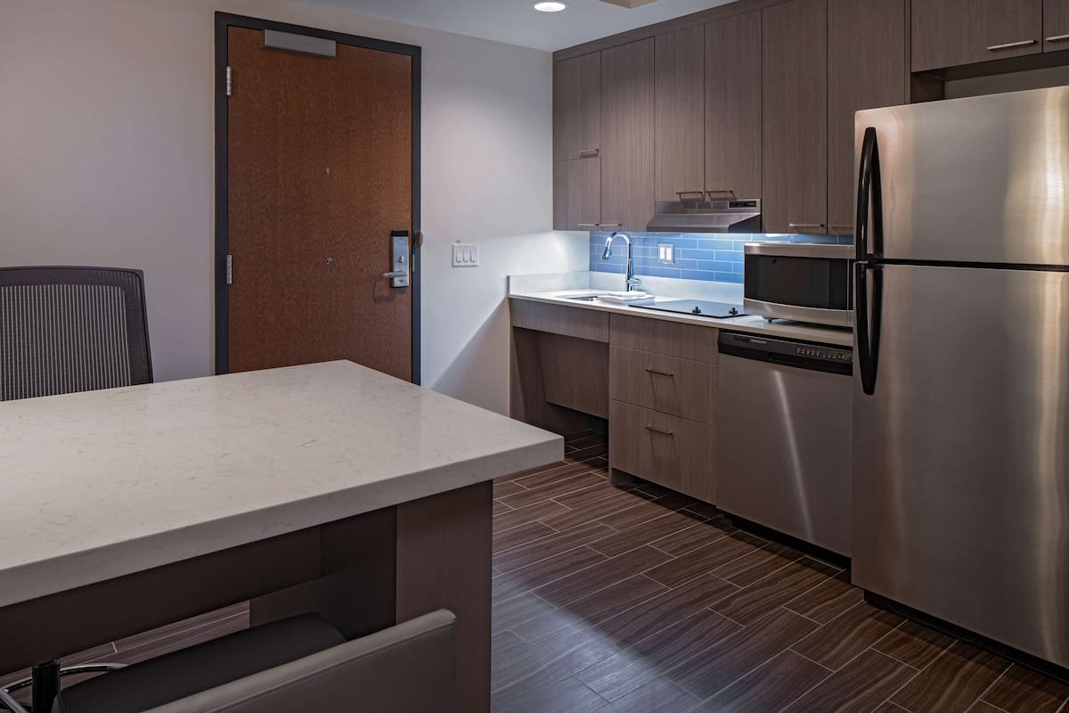 studio suite, 1 king bed with sofa bed, accessible | private kitchen | coffee/tea maker