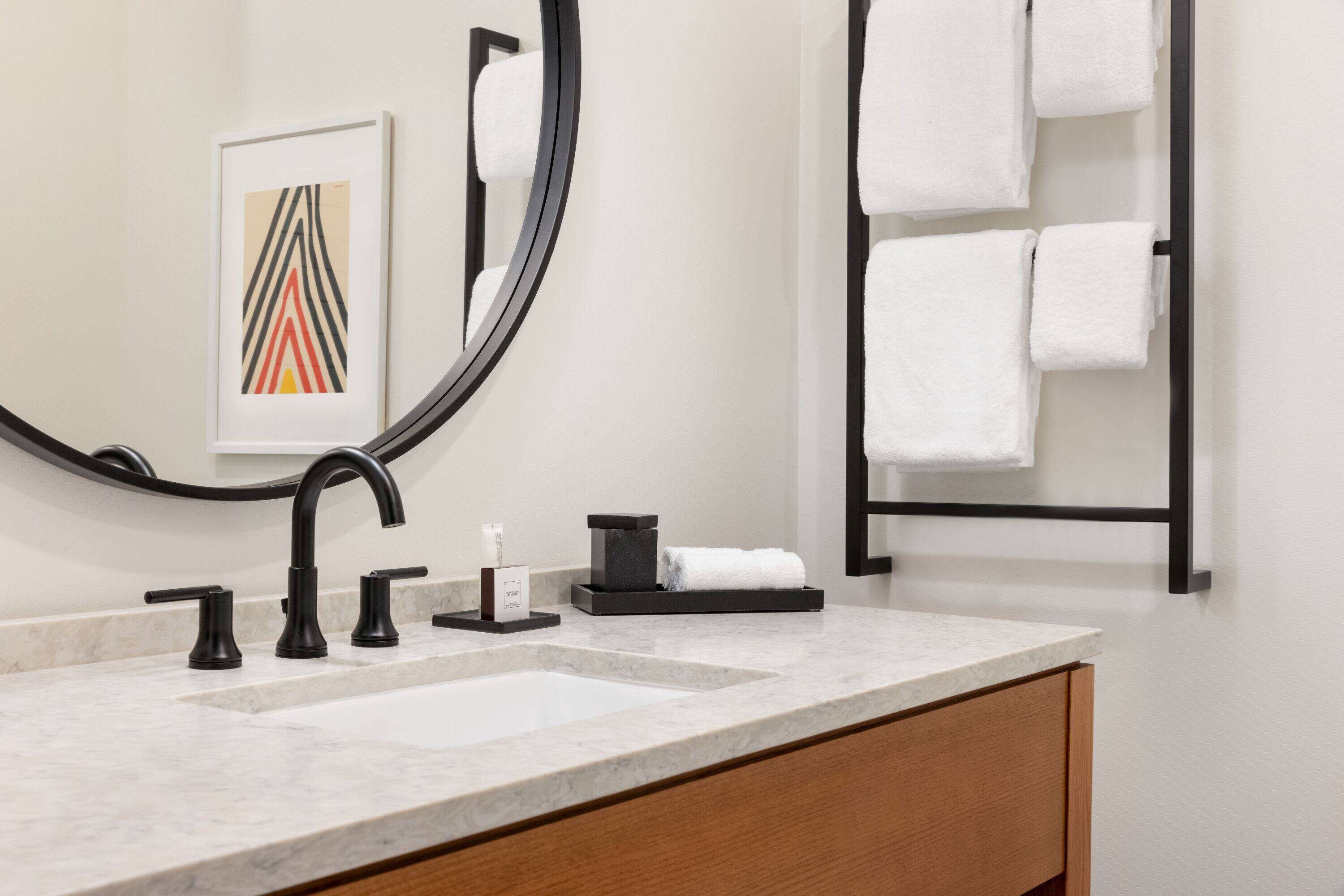 shower, designer toiletries, towels