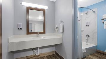Studio, Non Smoking (1 King Bed and 2 Double Beds) | Bathroom | Combined shower/bathtub, hair dryer, towels