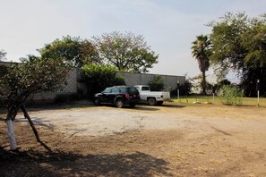 Free self parking - Capital O Hotel Partidor Del Sol, Oaxtepec (Tlayacapan)