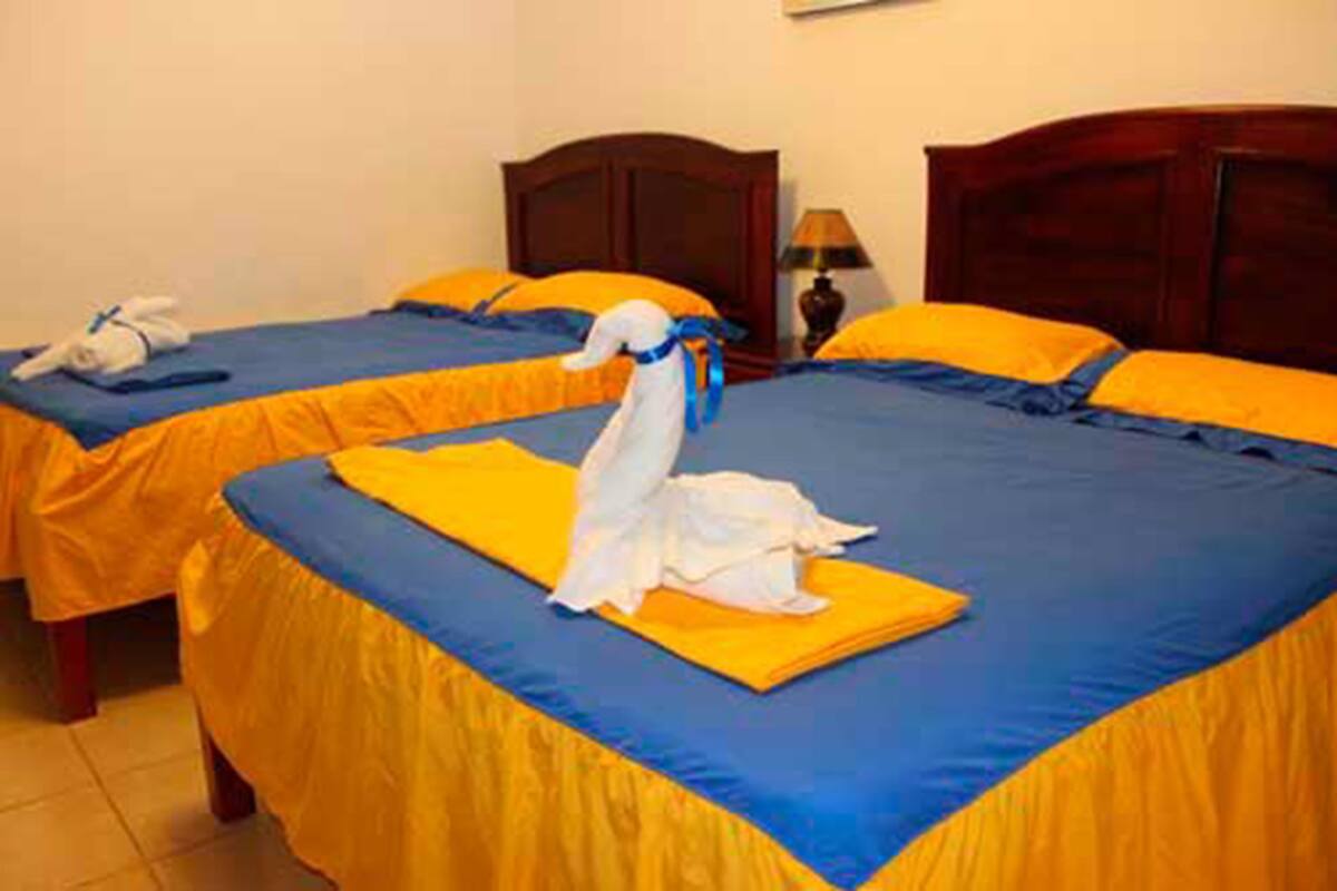 Family Room, Multiple Beds, Non Smoking | 4 bedrooms, blackout drapes, WiFi (free), bed sheets