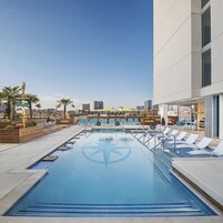 Outdoor pool, open 10:00 AM to 11:00 PM, cabanas (surcharge)