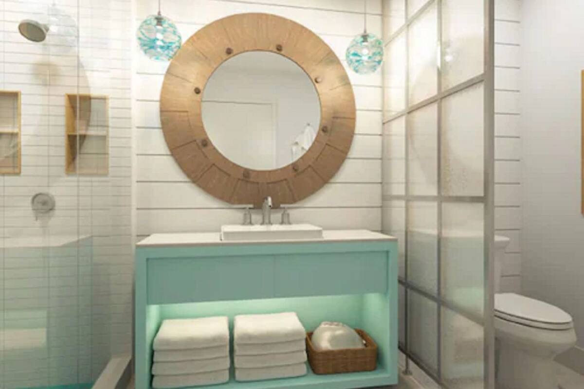 shower, designer toiletries, hair dryer, towels