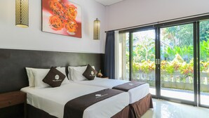 Deluxe Twin Room | Desk, WiFi (free), bed sheets - Purnama Hotel (Ubud)