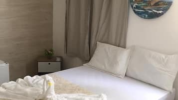 Hypo-allergenic bedding, minibar, blackout curtains, iron/ironing board