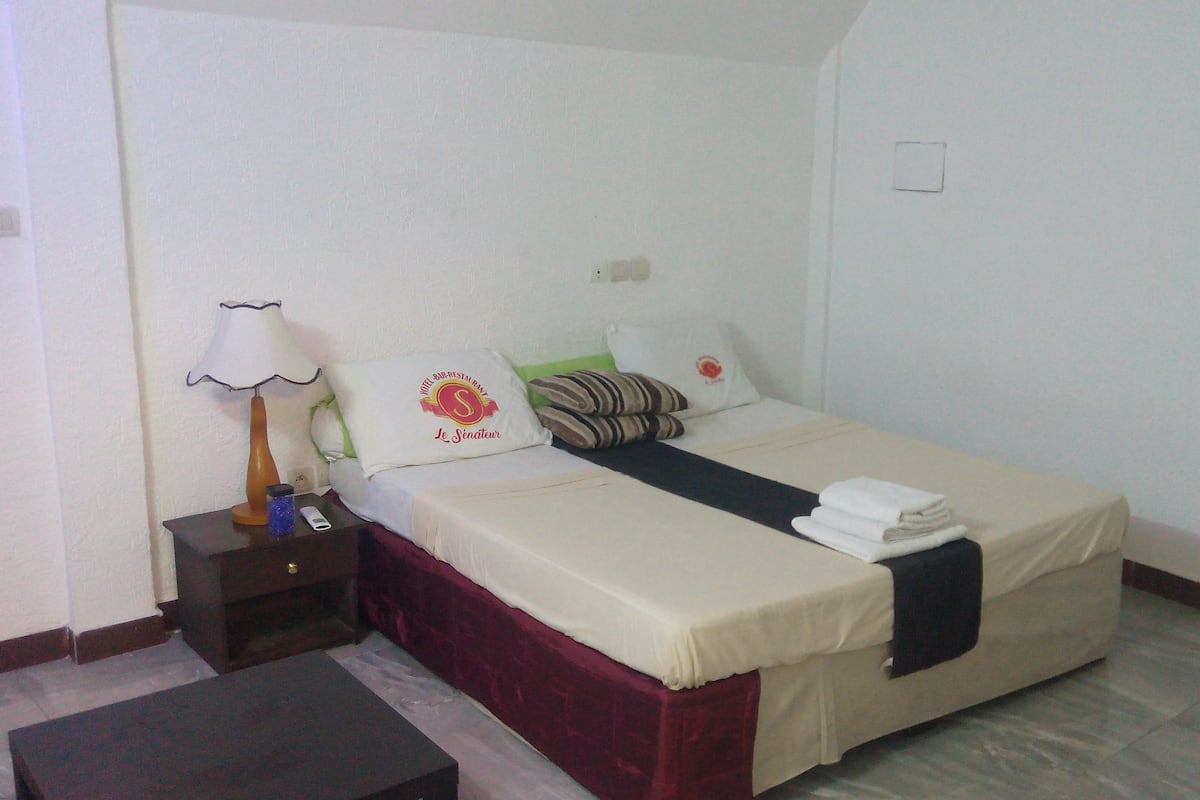 Minibar, desk, blackout curtains, iron/ironing board
