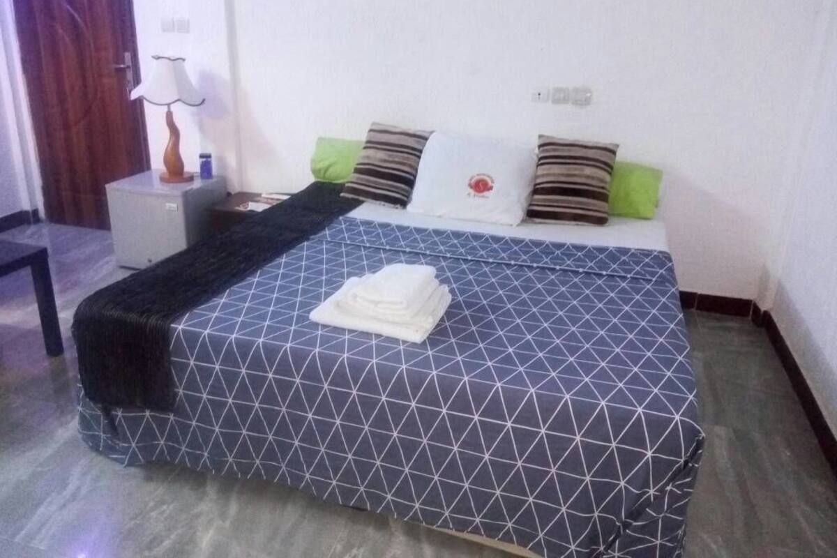 Minibar, desk, blackout curtains, iron/ironing board