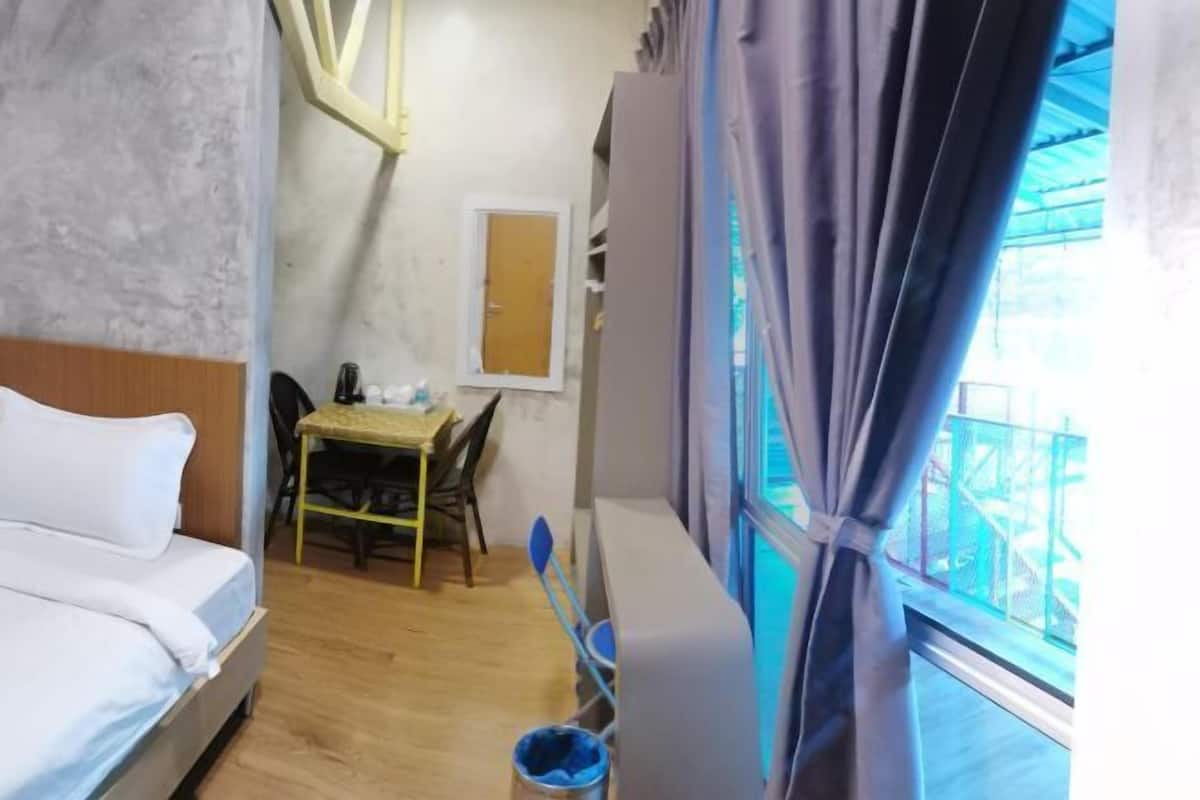Blackout drapes, iron/ironing board (on request), WiFi (free)