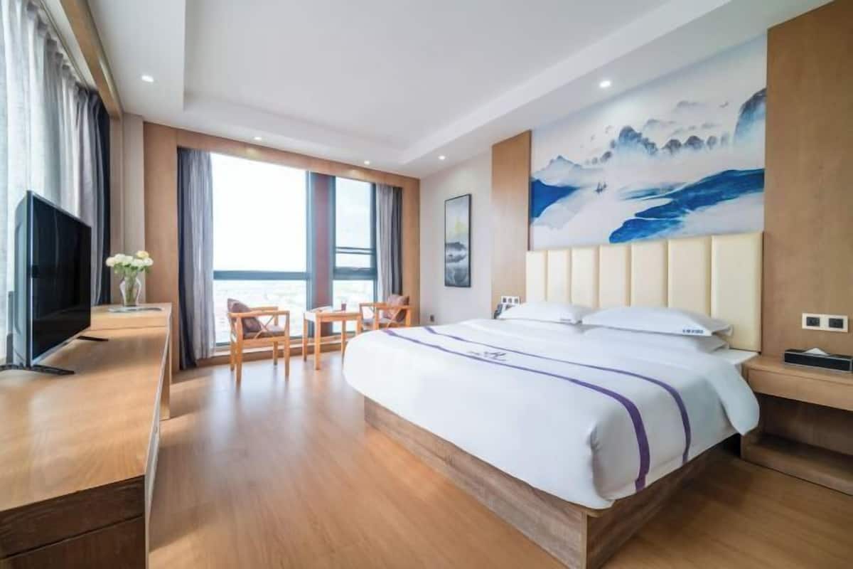 Blackout curtains, soundproofing, free WiFi, bed sheets