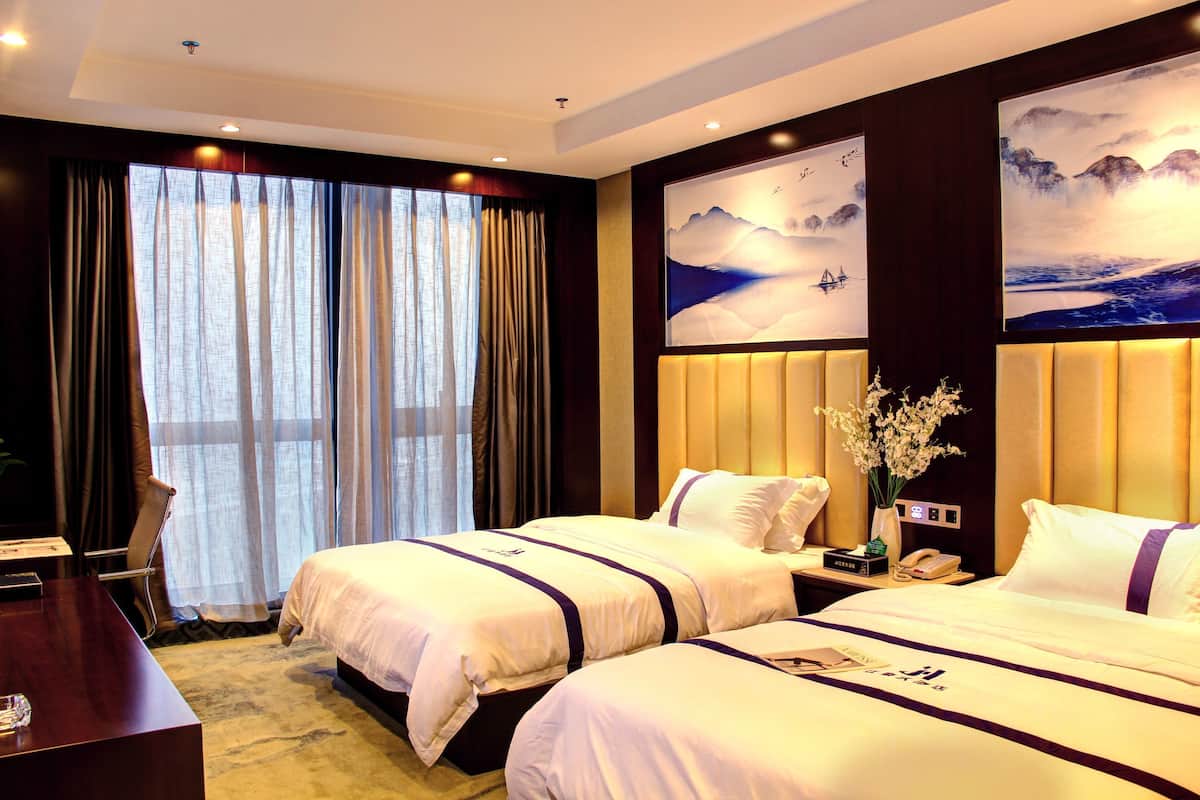 Blackout curtains, soundproofing, free WiFi, bed sheets