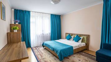 Premium bedding, down duvets, blackout curtains, soundproofing