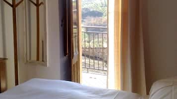 Desk, blackout curtains, soundproofing, rollaway beds