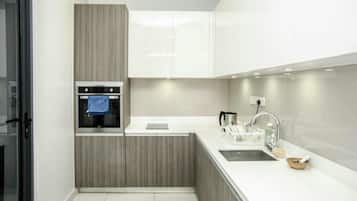 Luxury Condominium 2 | Private kitchenette | Fridge, microwave, stovetop, electric kettle