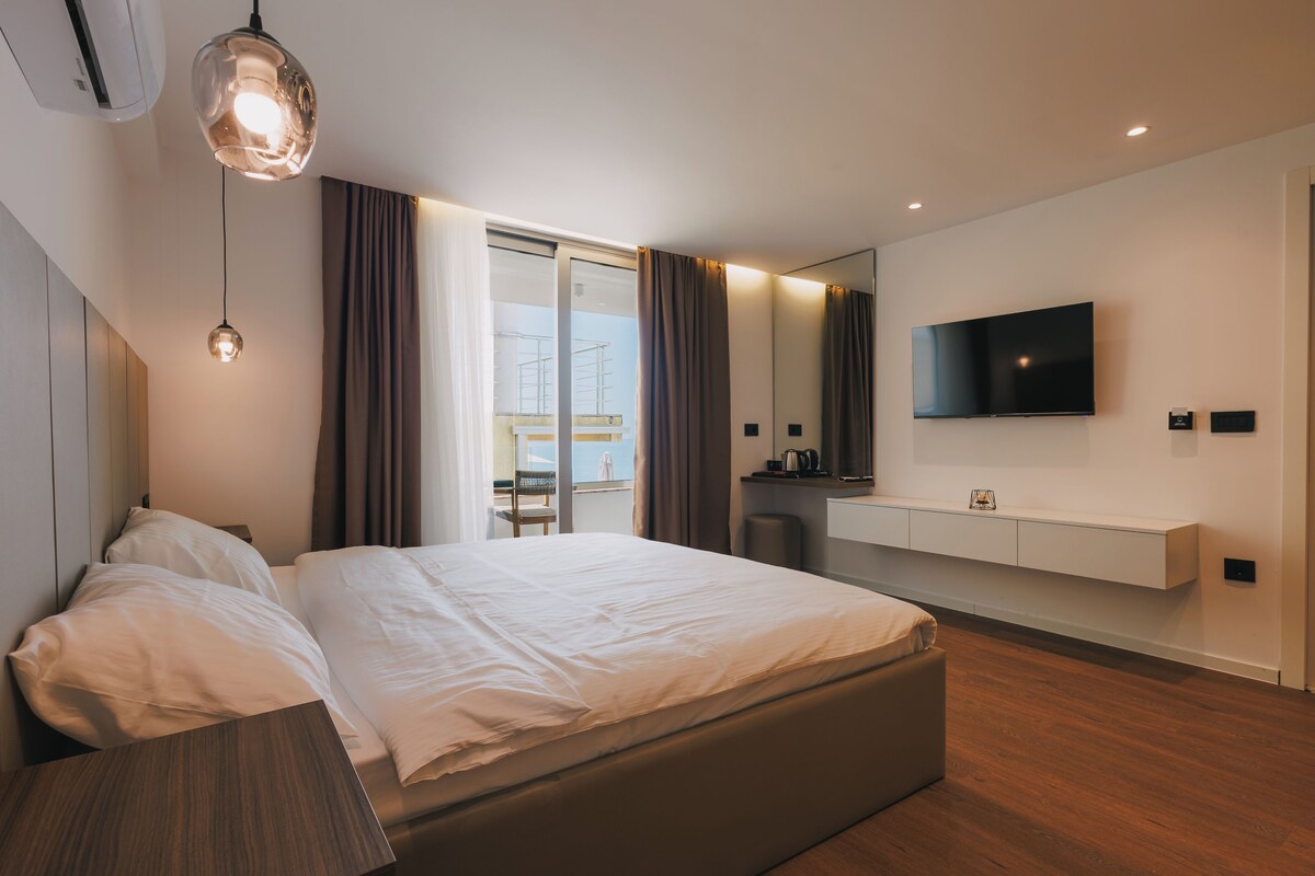 Deluxe Double Room, Balcony, Partial Sea View | Premium bedding, desk, laptop workspace, soundproofing
