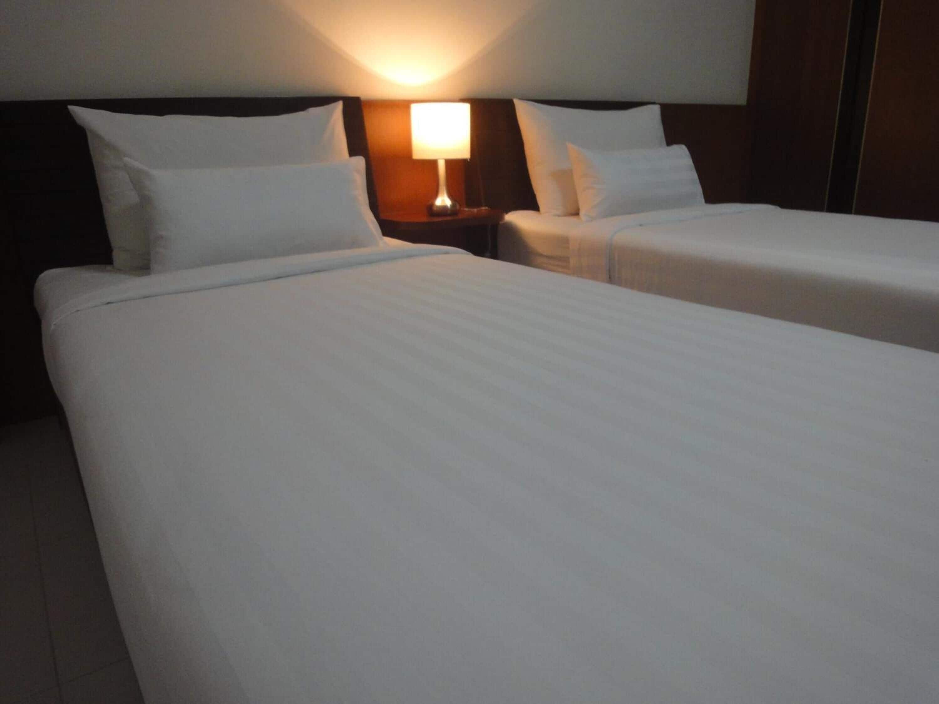 Blackout curtains, rollaway beds, free WiFi