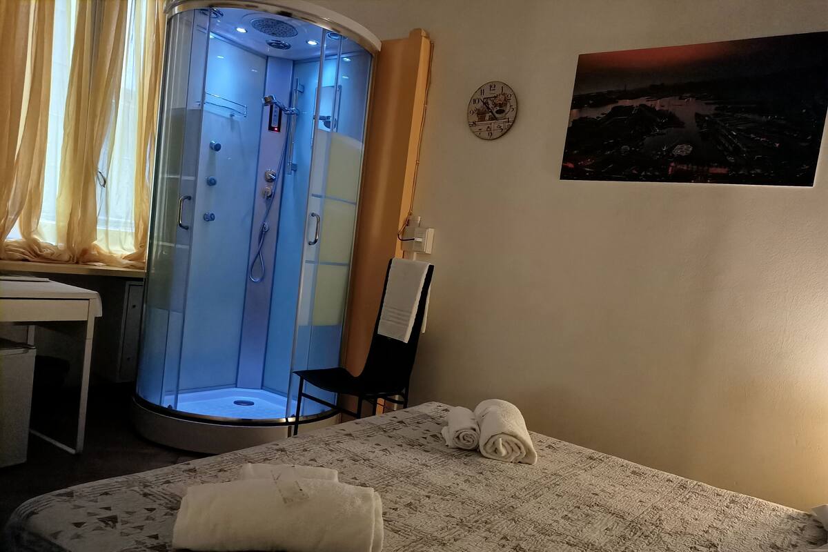 Double or Twin Room with Shower (external private bathroom) | Desk, blackout drapes, cribs (free), WiFi (free)