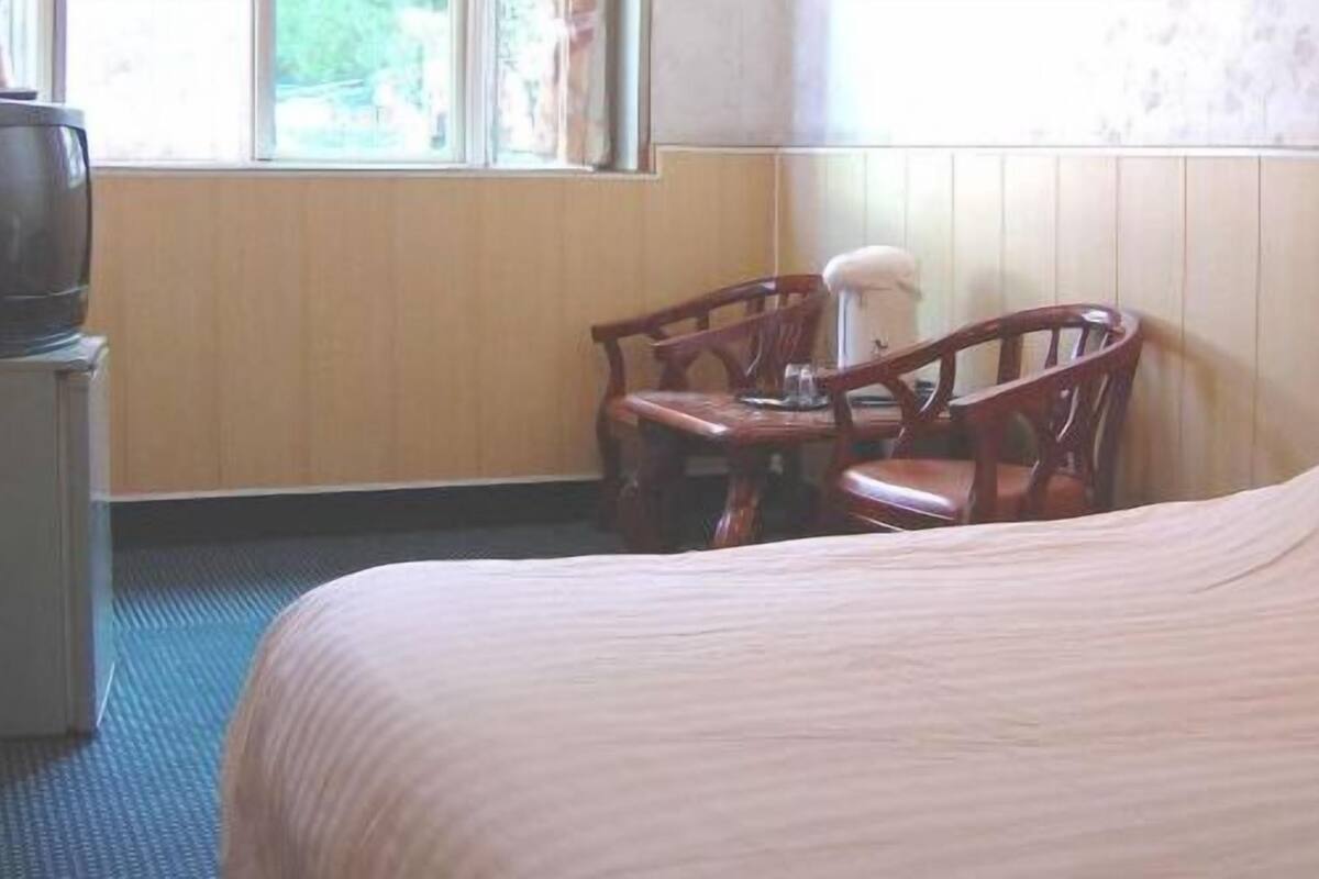 Desk, blackout curtains, free WiFi, bed sheets