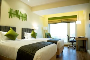 Chambre Prestige double ou avec lits jumeaux, 1 grand lit, non-fumeur | Minibar, coffre-fort, bureau, systĂšme dâinsonorisation