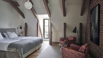 Habitación Deluxe, vista al jardín | Ropa de cama de alta calidad, edredón y cortinas blackout